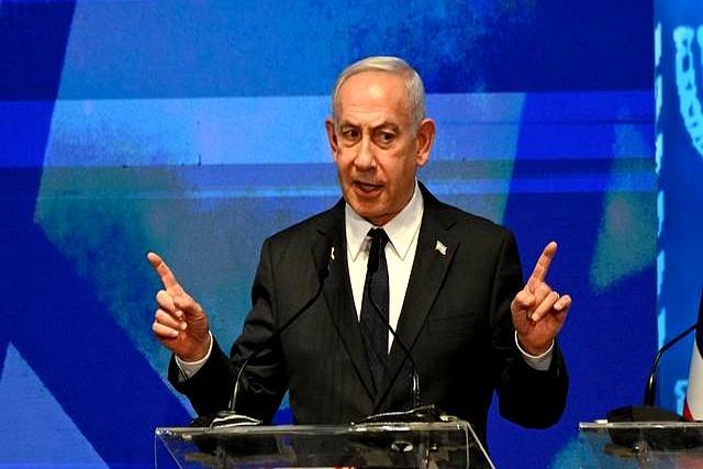 内塔尼亚胡要求与会者扫码