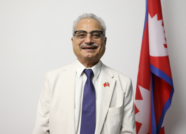 尼泊尔总理奥利乘机抵津