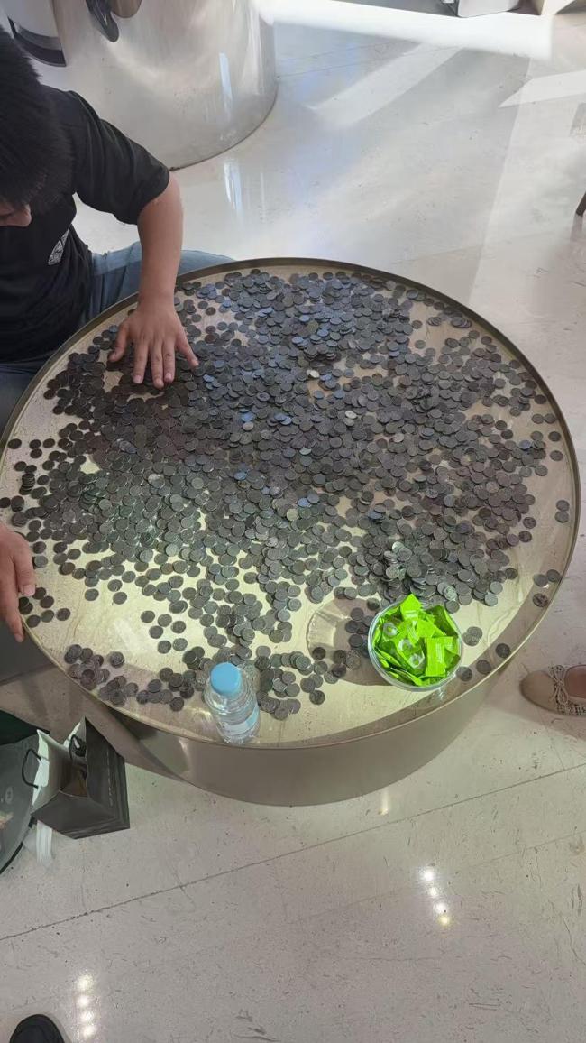 2万枚污损硬币遭银行拒绝兑换