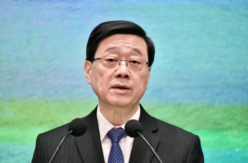 李家超:坚定维护联系汇率,稳金融中心地位 李家超:坚定维护联系汇率,稳金融中心地位