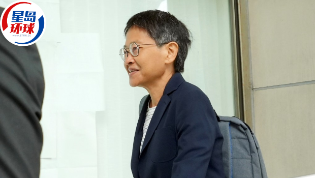 被告康佩玲。 被告康佩玲。