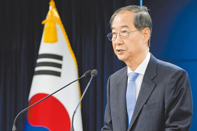 韩国代理总统韩悳洙21日表示，韩国与美国将于24日举行关税谈判。（路透）