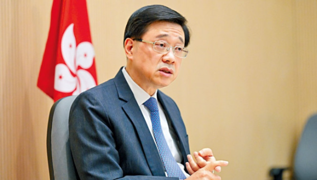 李家超吁侨界在国际舆论场全力发声