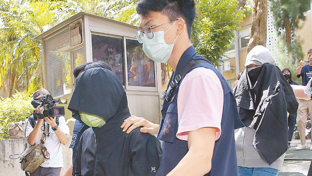 涉嫌恐吓京华城案检察官的周姓男子(左)及林姓女子(右)3日落网。