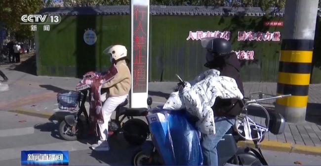 电动自行车“挡风被”到底该不该用